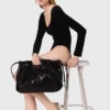 Bodysuit met fluweel en korsetdetails