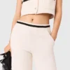 Broek met wijde pijpen en tweed-effect