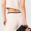 Broek met wijde pijpen en tweed-effect