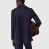 Colbert met plooien aan de achterkant