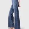 Denimjeans met wijde pijpen en studs