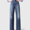 Denimjeans met wijde pijpen en studs