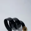 Dubbele M-riem van leer met krokodillenlook