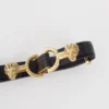 Dunne leren riem met leeuwenbit