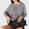 Geborduurde gebreide vest