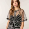 Geborduurde tule top