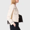 Gecropte vest met stiksels