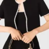 Gecropte vest met stiksels