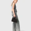 Getailleerd vest met sierknopen