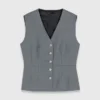 Getailleerd vest met sierknopen