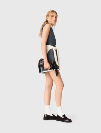 Getailleerde jurk met gelaagde look