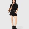 Glanzende tweed short