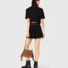 Glanzende tweed short