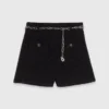 Glanzende tweed short