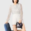 Jumpsuit van tweed met pailletten
