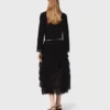Kort vest met sieradenaccenten