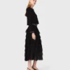 Kort vest met sieradenaccenten