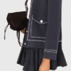 Lang gebreid vest met stiksels