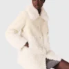 Lange jas van imitatiebont