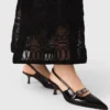 Leren pumps met bandje met oogjes