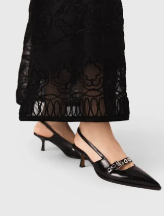 Leren pumps met bandje met oogjes