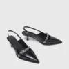 Leren pumps met bandje met oogjes
