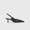 Leren pumps met bandje met oogjes