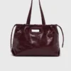 M-draagtas van gekraakt leer