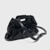 Milpli mini-clutch van gekraakt leer