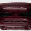 Milpli mini-clutch van gekraakt leer