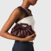 Milpli mini-clutch van gekraakt leer