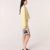 Mini M Bag van reliëfleer met ketting