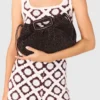 Mipli clutch met bouclé-effect