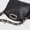 Miss M Mini-tas met gouden handvat Miss M Mini-tas met gouden handvat