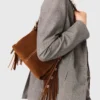 Miss M Mini-tas van suède met stiksels