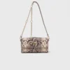 Miss M Walk-tas met python-effect