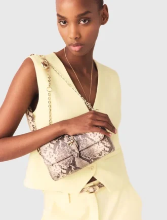 Miss M Walk-tas met python-effect