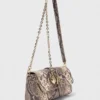 Miss M Walk-tas met python-effect