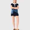 Polojurk met contrasterende bies