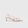 Pumps met dubbele gesp en slingback