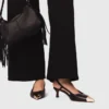 Pumps met slingback van glad leer