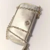 Sarah-clutch van metallic leer