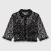 Top met bloemenprint en pailletten