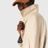 Trenchcoat met contrasterende mouwen en kraag
