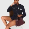 Tweedjasje met 4 zakken