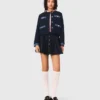 Tweedjasje met denimrand