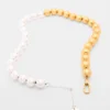 Tweekleurige parelketting
