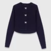 Vest met strikknopen met juwelen