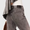 Wijd uitlopende jeans met kettingriem