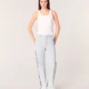 Wijd uitlopende jeans met strass-uitsnijding